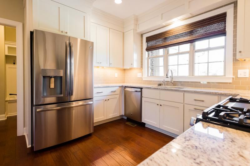 Easton White Slab Kitchen Cabinets